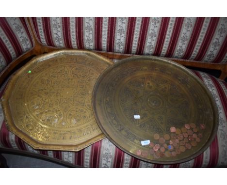 Two Eastern style brass trays of large proportions, , for scale circular one is approx. 57cm in diameter