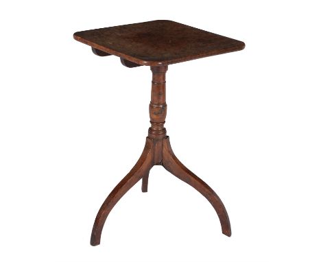 A George III burr yew and yew occasional table, circa 1810, the rectangular tilt top above a turned column and tripod feet, 7
