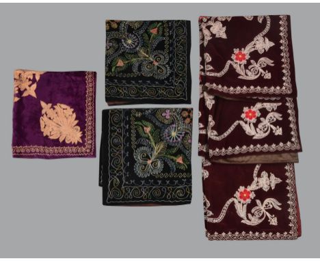 A pair Persian textiles, late 19th or early 20th century, comprising: a pair of square panels embroidered in bright colours o