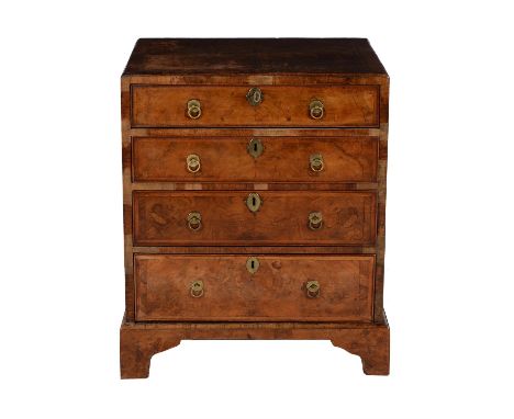 A walnut and feather banded chest of drawers, circa 1730 and later, the caddy top above an arrangement of four drawers, 75cm 