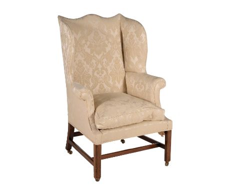 A George III mahogany and upholstered wing armchair, circa 1780, 121cm high, 83cm wide, 80cm deepCondition Report: Marks, kno