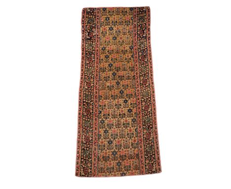 A runner, probably Bakshaish, approximately 267 x 101cmCondition Report: Wear overall. Wear reveals underlying weft in areas 