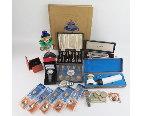 A Murano glass clown, a set of six silver plated coffee spoons, cased, a cased Harmonica, Slazenger wristwatch, a Cobolt Spee