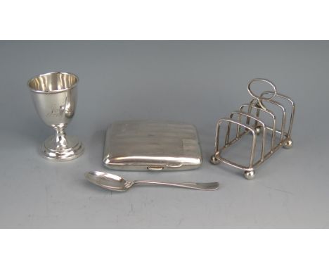 An Edward VII silver four division toast rack, maker Cooper Brothers &amp; Sons Ltd, Sheffield, 1902, of arched outline with 