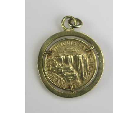 An 18ct Gold Discovery of The Victorian Falls 1855 Medallion in a pendant mount, 20.5mm diam., 5.2g gross, boxed and with a d