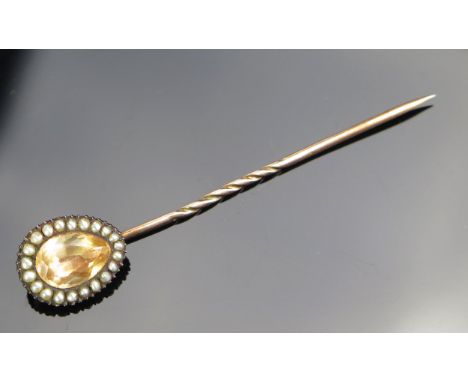 A Georgian Foil Backed Paste and untested Pearl Pin in a yellow metal setting, 2.8g 