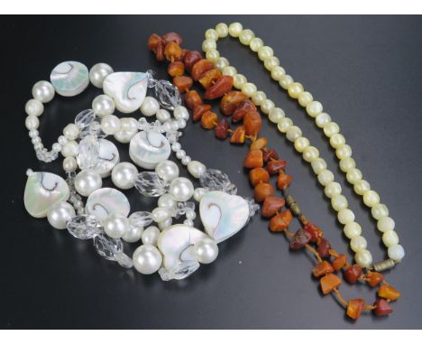 Rough Amber Necklace, untested pearl and crystal necklace and one other 