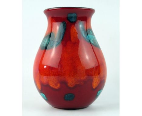 A Poole pottery vase, with polychrome Volcanic pattern decoration, 16cm high. 