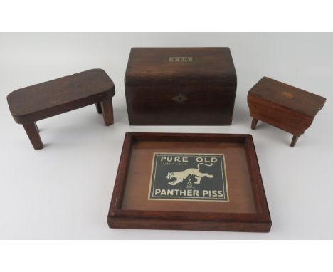 A Victorian rosewood two division tea caddy, two miniature pieces of furniture and a framed advertising panel. 