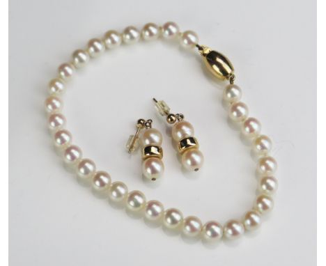 A 7.5" untested Pearl and 9ct Gold Bracelet and pendant earrings 
