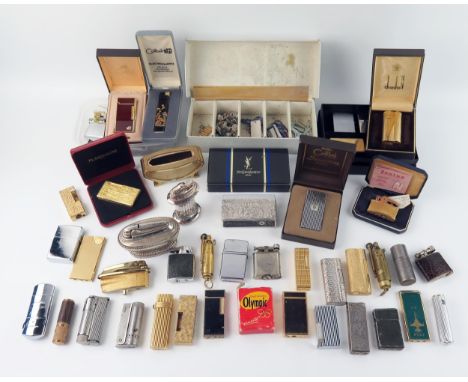 A Dunhill gold plated cigarette lighter in a fitted case, together with assorted other cigarette lighters by Calibri, Zippo a