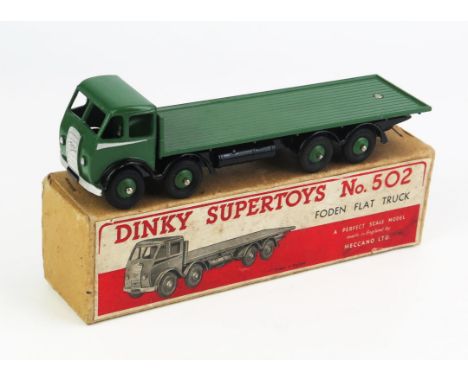 Dinky 502 Foden Flat Truck - dark green cab, back and ridged hubs, silver flash, black chassis, mixed tyres "20" decal to rea