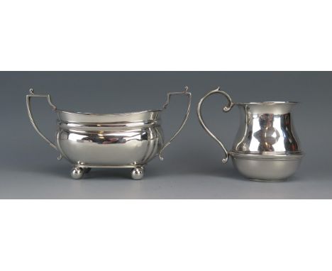 A George V silver christening mug, maker S Blanckensee &amp; Son Ltd, Birmingham 1923, initialled, of ovoid outline with ribb
