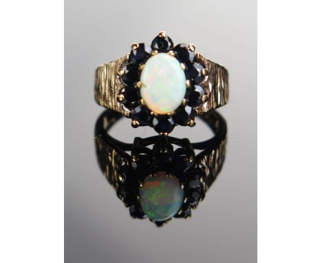 A 9ct Gold, Opal and Sapphire Cluster Ring, 14.5x12.5mm head, size L, 4.8g 