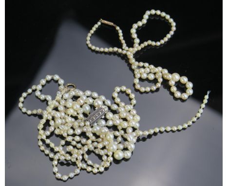 A 16.5" Pearl Necklace with barrel clasp (largest pearl c. 7mm, 8.6g) and two others with damaged clasps (28.7g)-all untested