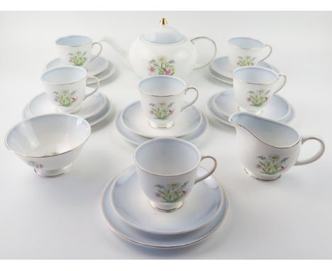 A Susie Cooper 'Romance Blue' pattern tea service, includes teapot, sugar basin, cream jug, six tea cups, six saucers and six