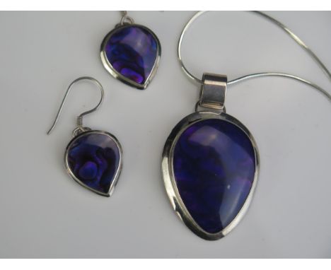 A Silver and Abalone and Resin Pendant with matching earrings, 43mm pendant drop and on chain 