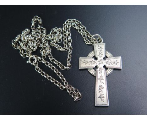 A Victorian Silver Cross Pendant with chased decoration and on a later silver chain, Birmingham 1898, William Light (probably