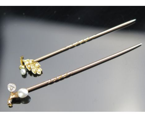 A Diamond and Pearl Pin and Pearl Pin, both in high carat gold settings, 2.2g (both untested) 