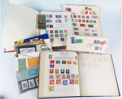 The Strand stamp Album containing British, Commonwealth and world postage stamps, an album of British stamps and some loose s