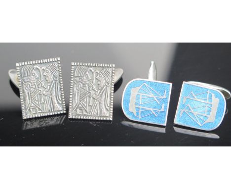 A Pair of Norwegian Silver Cufflinks decorated with figures by Otteren and a pair of Sporrong silver and enamel cufflinks 