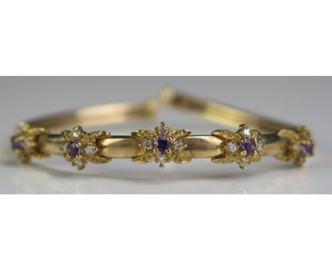 A 9ct Gold, Amethyst and White Stone Torque Bangle, 8.7g 