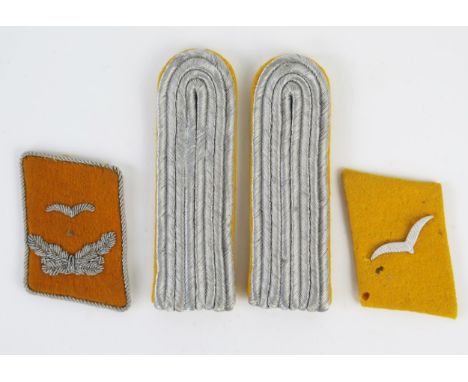 A pair of Third Reich period Luftwaffe, epaulettes, together with collar badges for private and Lieutenant, (4). 
