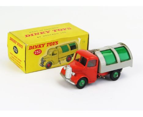 Dinky 252 Bedford Refuse Wagon - bright orange cab and chassis, light grey back, green plastic side shutters and metal rear s