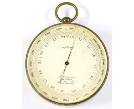 A NICKEL PLATED BRASS ANEROID BAROMETER, THE SILVERED DIAL INSCRIBED P GARGORY OPTICIAN 41 BULL STREET BIRMINGHAM, 6.5CM D, L