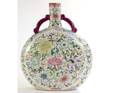 A CHINESE PORCELAIN FAMILLE ROSE MOON FLASK, WITH AUBERGINE HANDLES, ENAMELLED WITH CLASSIC LOTUS AND PEONY MEANDER ON A CREA