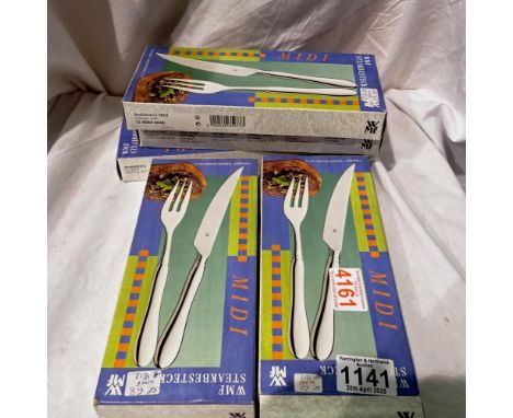 Five boxed sets of WMF steak knives and forks. Not available for in-house P&amp;P 