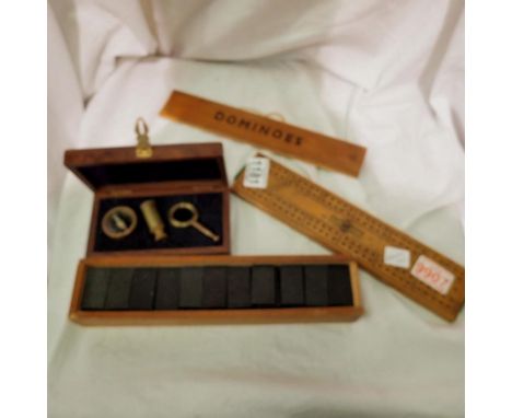 Boxed set of dominoes and a cased miniature three draw telescope with compass and miniatures. Not available for in-house P&am