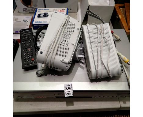 Samsung DVD V5600 DVD and VHS player and a Roberts radio. All electrical items in this lot have been PAT tested for safety an