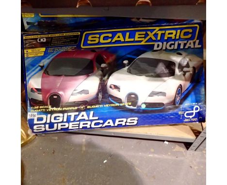Two boxed Scalextric sets, cars included, Continental sports cars and digital sets. Not available for in-house P&amp;P