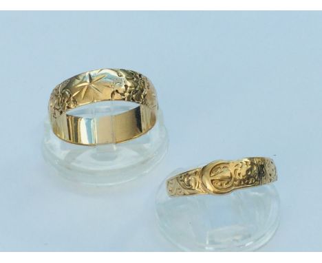 A 9ct yellow gold patterned wedding ring, weighs 3.8 grams, finger size T. Together with a 9ct yellow gold buckle ring, weigh