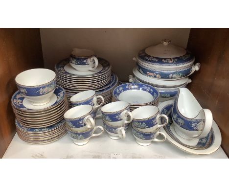SECTION. 6 A Wedgwood Blue Siam 8 place dinner service including two Tureens, gravy boat, meat platter, complete set of plate