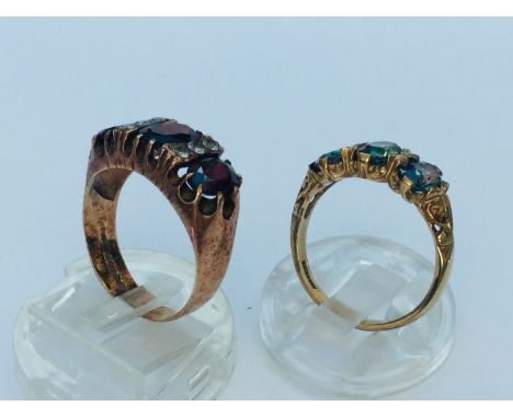 Two 9ct yellow gold dress rings set with coloured stones in a gypsy style setting, total weight 8.4 grams.