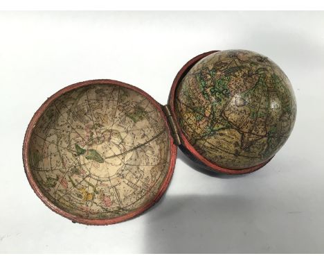 A fine 18th century English 2¾ inch pocket globe by John Senex, printed with a cartouche reading 'A New and Correct Globe of 