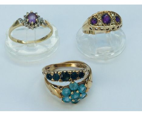 Four 9ct yellow gold rings, set with various coloured stones, total weight 10.1 grams. 