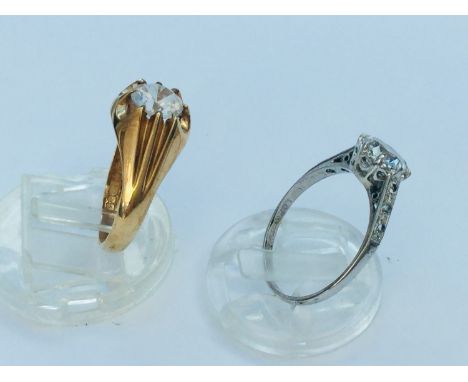 Two 9ct gold dress rings, set with white stones, total weight 5.2 grams. 