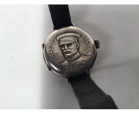 An unusual .935 silver-cased wristwatch, appears to be converted from a fob watch, the front of the case with hinged cover re