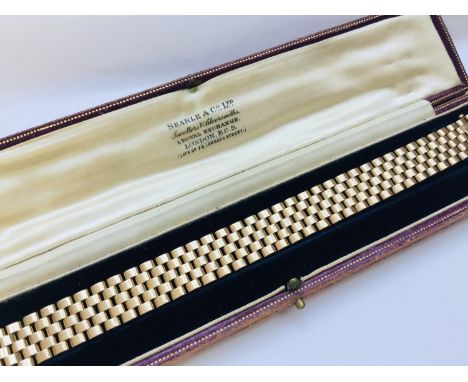 A 9ct gold bracelet in jubilee style, weighing 26.1 grams in Searle &amp; Co Ltd fitted box. 