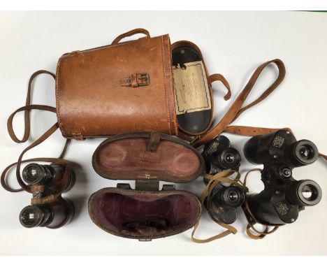 A pair of WWII binoculars by Taylor-Hobson dated 1941 and marked with broad arrow and 'O.S. 108 M.A. Bino Prism No.2 MKII', w