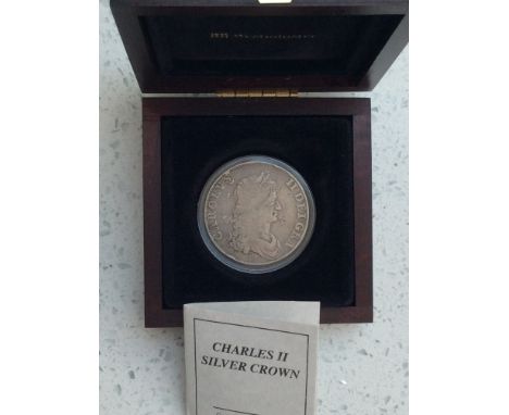 A Charles II Silver Crown, 1662, first type, Obv. Effigy of Charles II, Rose below, Rev. Four Cruciform Shields, interlinked 
