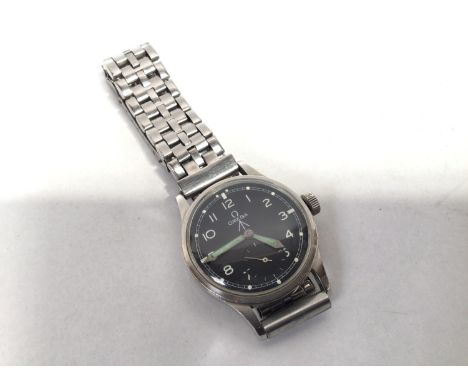 A WWII military issue stainless steel Omega 'Dirty Dozen' 'W.W.W' (Wrist Watch Waterproof) wristwatch, the black enamel dial 