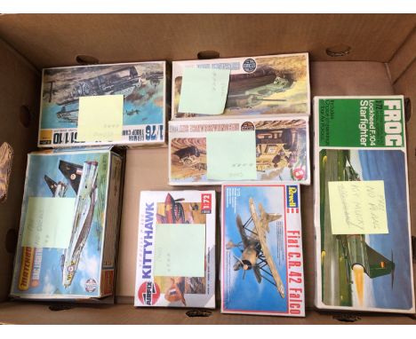 Eleven various model kits including Puraga German Light Tank, Airfix Crusader Tank, Airfix Kittyhawk and Revell USS Dallas Su
