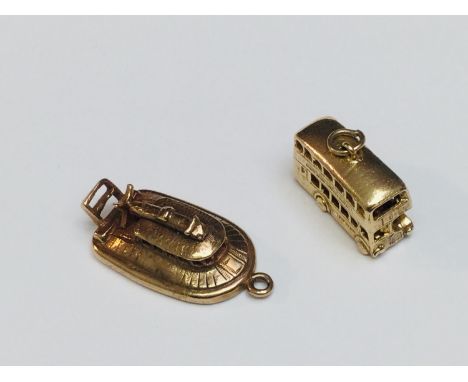 Two 9ct yellow gold novelty transport charms, one of a double decker bus, the other a hovercraft, total weight of charms 8.2 