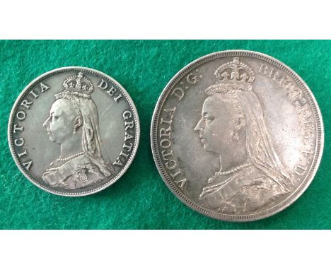 Two 1887 silver coins from the Jubilee coinage of Queen Victoria ' a crown grading vf/fine, with some wear on the high relief