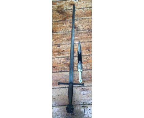 A decorative Spanish Catholic Kings sword with motto 'Tanto Monta Monta Tanto', 120cm, together with a ceremonial dagger in b