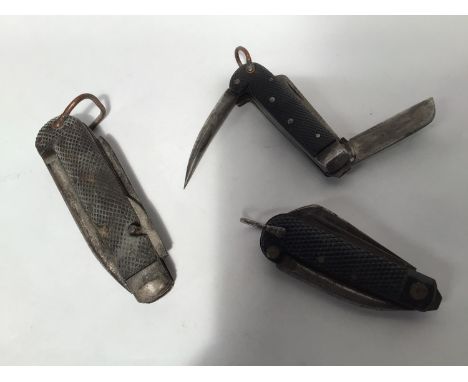 Three assorted folding pocket/jack knives, one with blade marked 'Butler', another with broad arrow mark etc. 